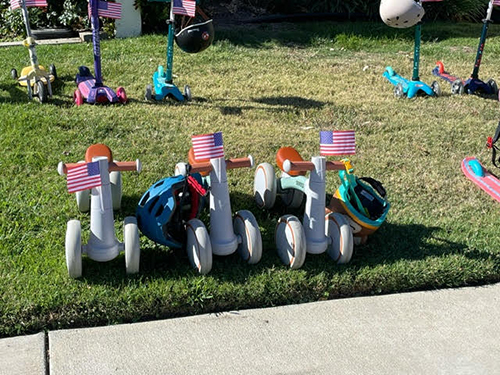 3 kids bicycle with small American flag